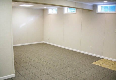 Finished basement without any furniture in Norwalk.
