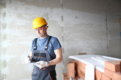 Contractor ordering supplies for a basement waterproofing installation in Norwalk.